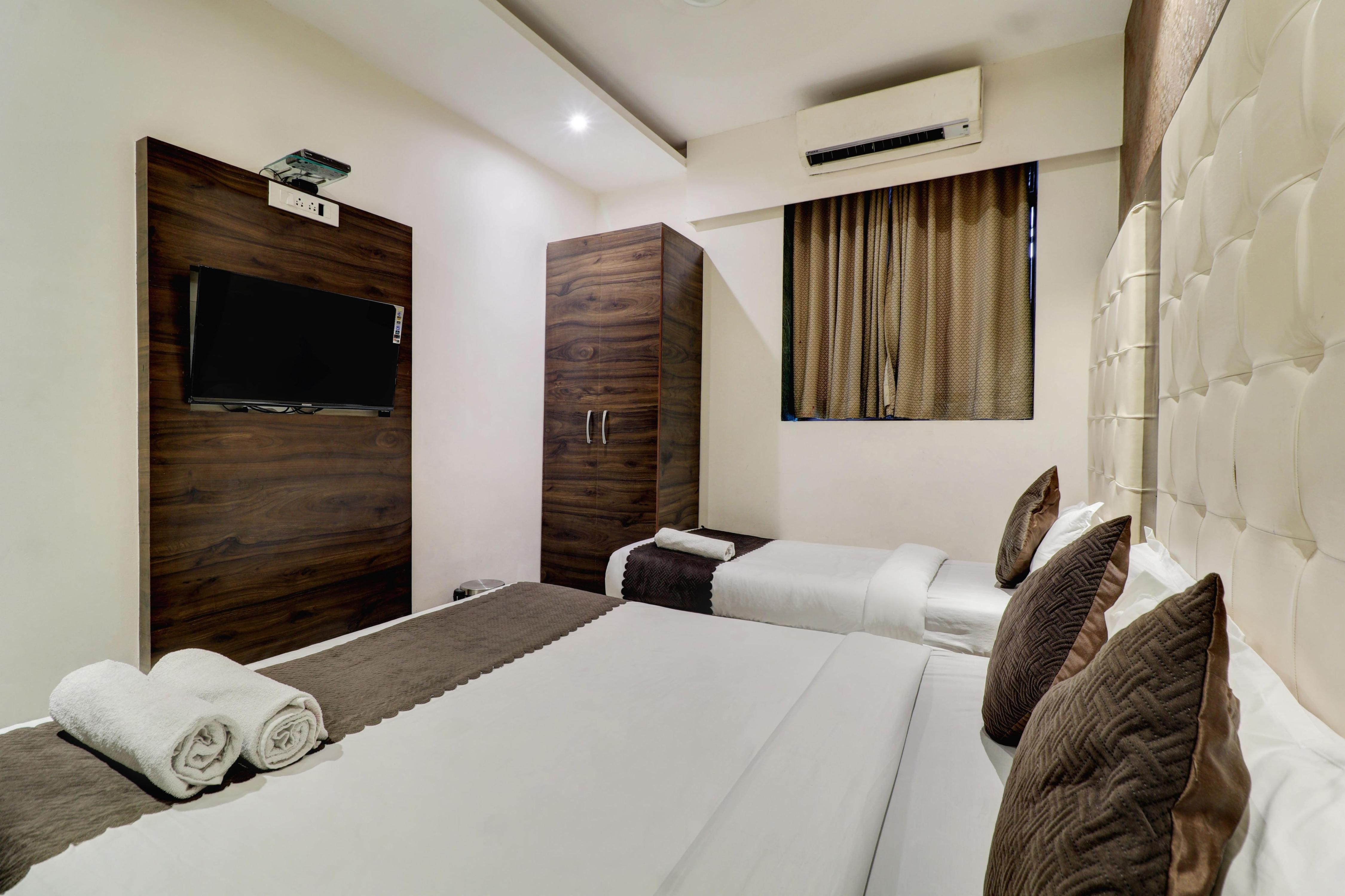 Hotel AK International Room Type - Deluxe Triple Room