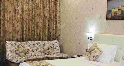 HOTEL GRAND MAPLE Room Type - Deluxe Room