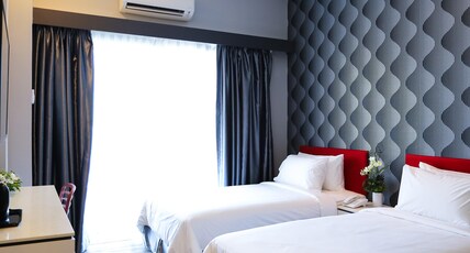 Cenang Plaza Beach Hotel Room Type - Deluxe Street Facing Twin Bed Cenang Plaza Beach Hotel Room Type - Deluxe Street Facing Twin Bed