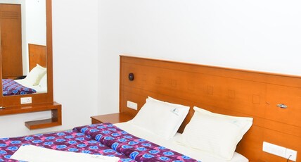 HOTEL KURUNJI MERIDIAN Room Type - Deluxe Room