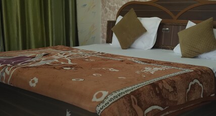 Hotel Maheshwari and Banquet Hall Room Type - Standard Room with Balcony and Mountain View Hotel Maheshwari and Banquet Hall Room Type - Standard Room with Balcony and Mountain View