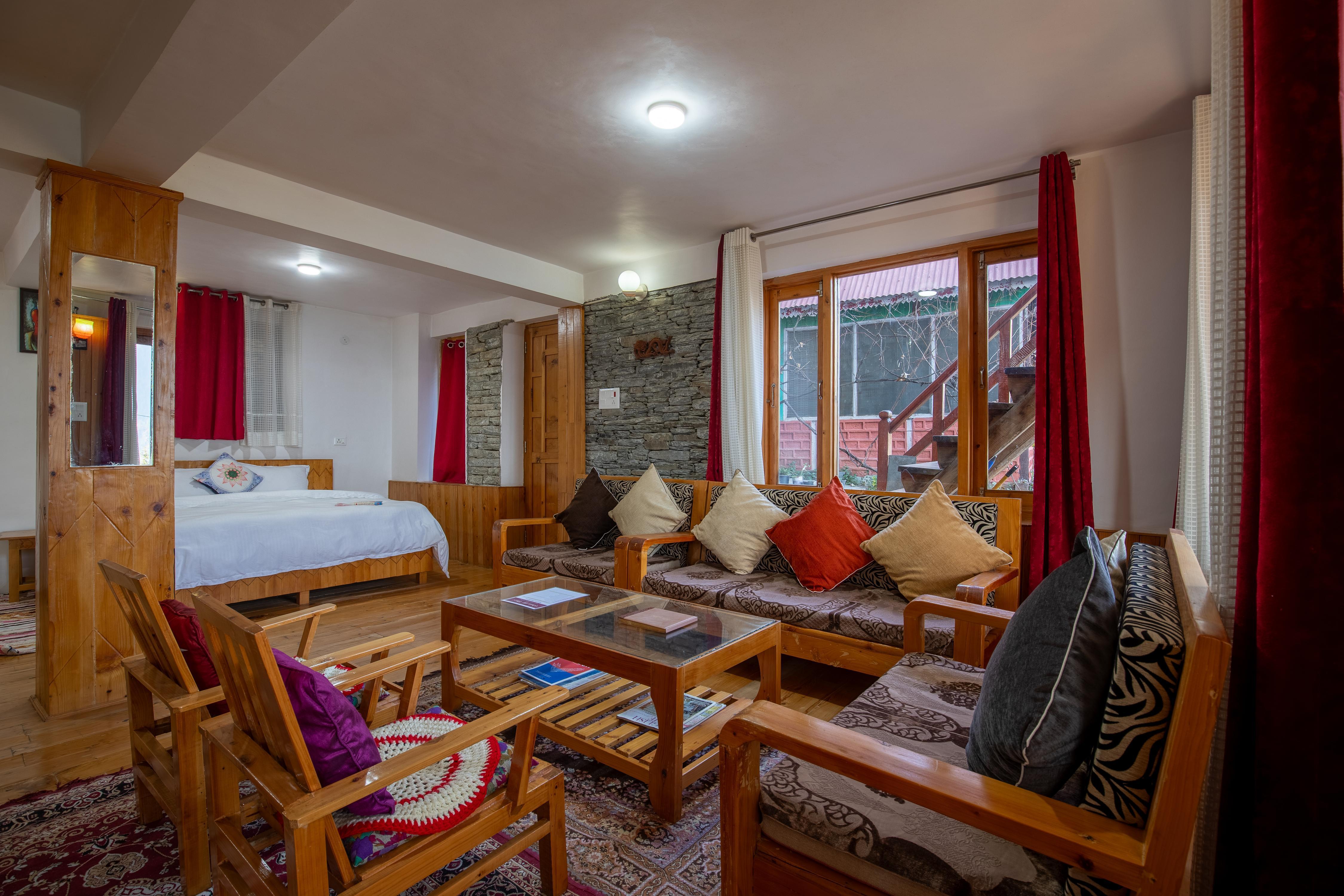 Ishan Log Hut Room Type - Family Suite With Garden And Snow Capped Thirthan Range Mountain View Ishan Log Hut Room Type - Family Suite With Garden And Snow Capped Thirthan Range Mountain View