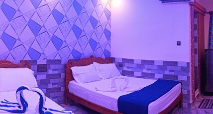 Richard Residency Room Type - Quadruple  Deluxe A/C room