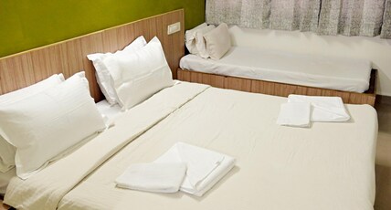 Western Tower Hotel Room Type - Deluxe Triple AC