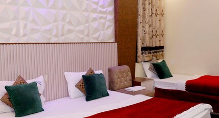 Hotel Om International @Paharganj Room Type - Triple Bed