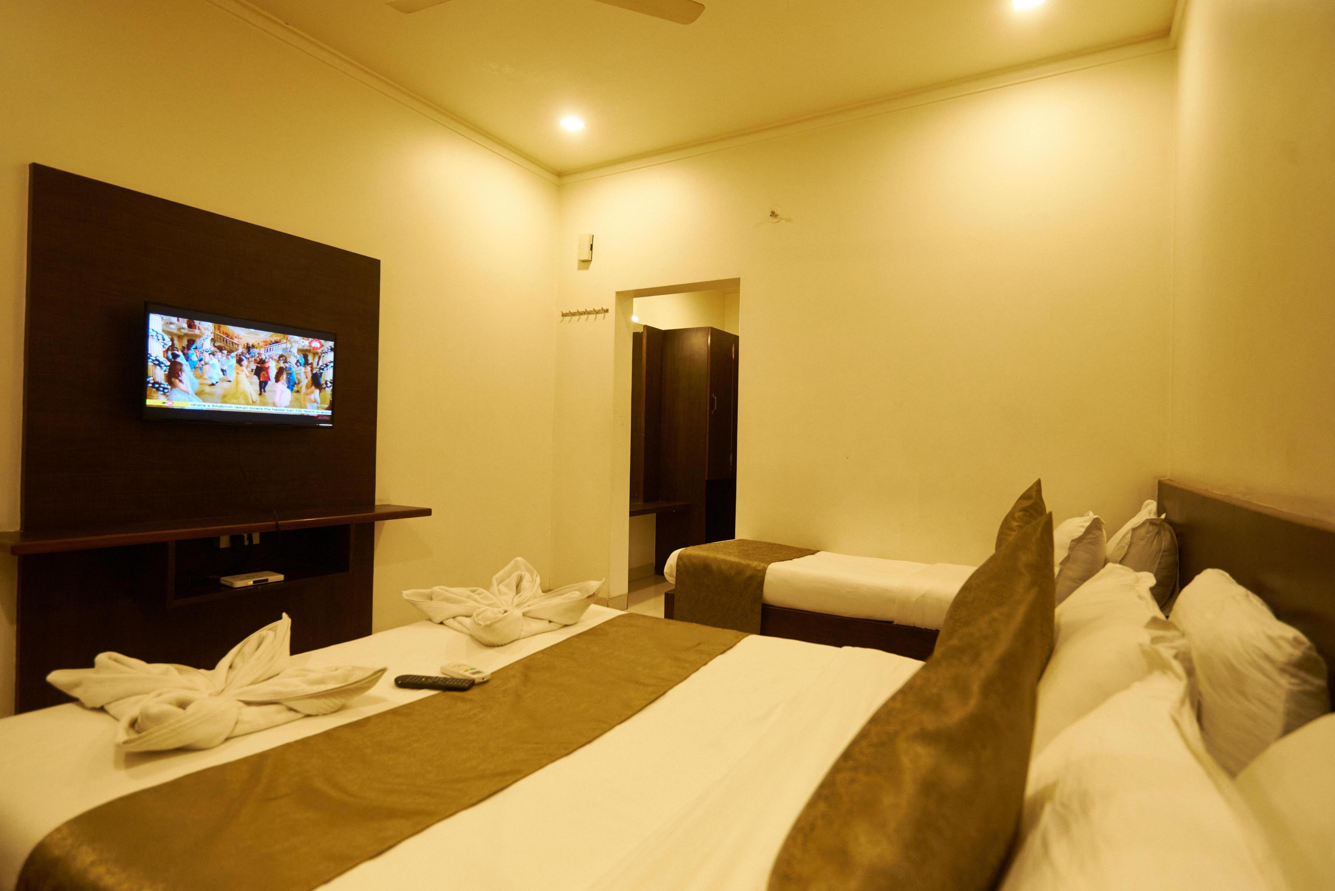 Hotel Pride Inn Room Type - Triple bed-Non-A.C Hotel Pride Inn Room Type - Triple bed-Non-A.C