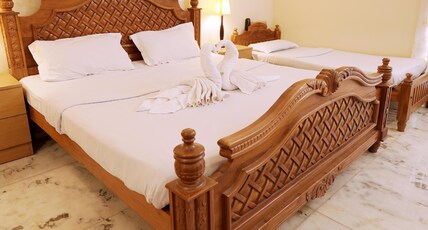 Metropolitan Serviced Villa | 10 min to Kaloor Stadium Room Type - Deluxe Family Room Metropolitan Serviced Villa | 10 min to Kaloor Stadium Room Type - Deluxe Family Room