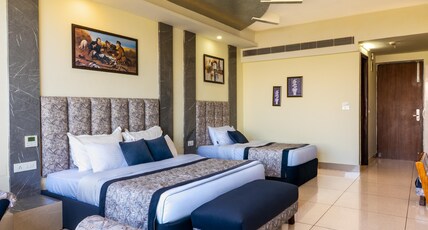 SS Resort ( Centrally heated and Air conditioned) Room Type - Family Room (Valley View) With Balcony SS Resort ( Centrally heated and Air conditioned) Room Type - Family Room (Valley View) With Balcony