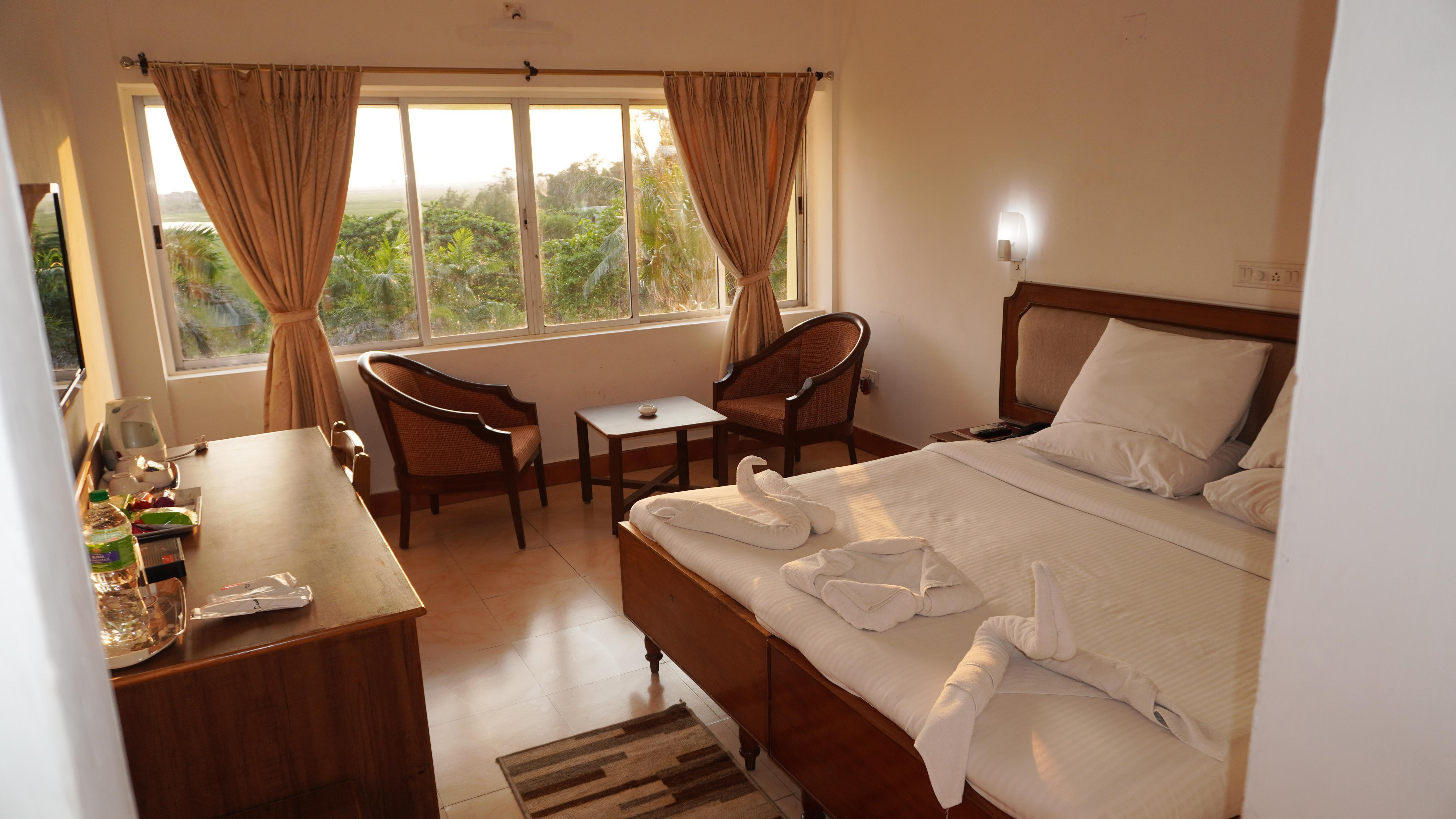 Hotel Golden Anchor Dhamara - Tap to explore photos