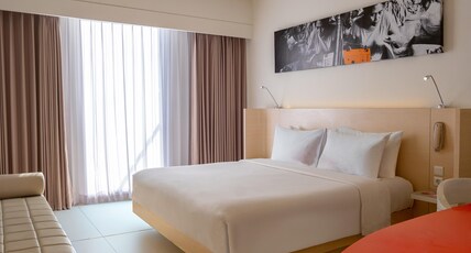 HARRIS Hotel & Conventions Denpasar Bali Room Type - HARRIS Deluxe with Breakfast HARRIS Hotel & Conventions Denpasar Bali Room Type - HARRIS Deluxe with Breakfast