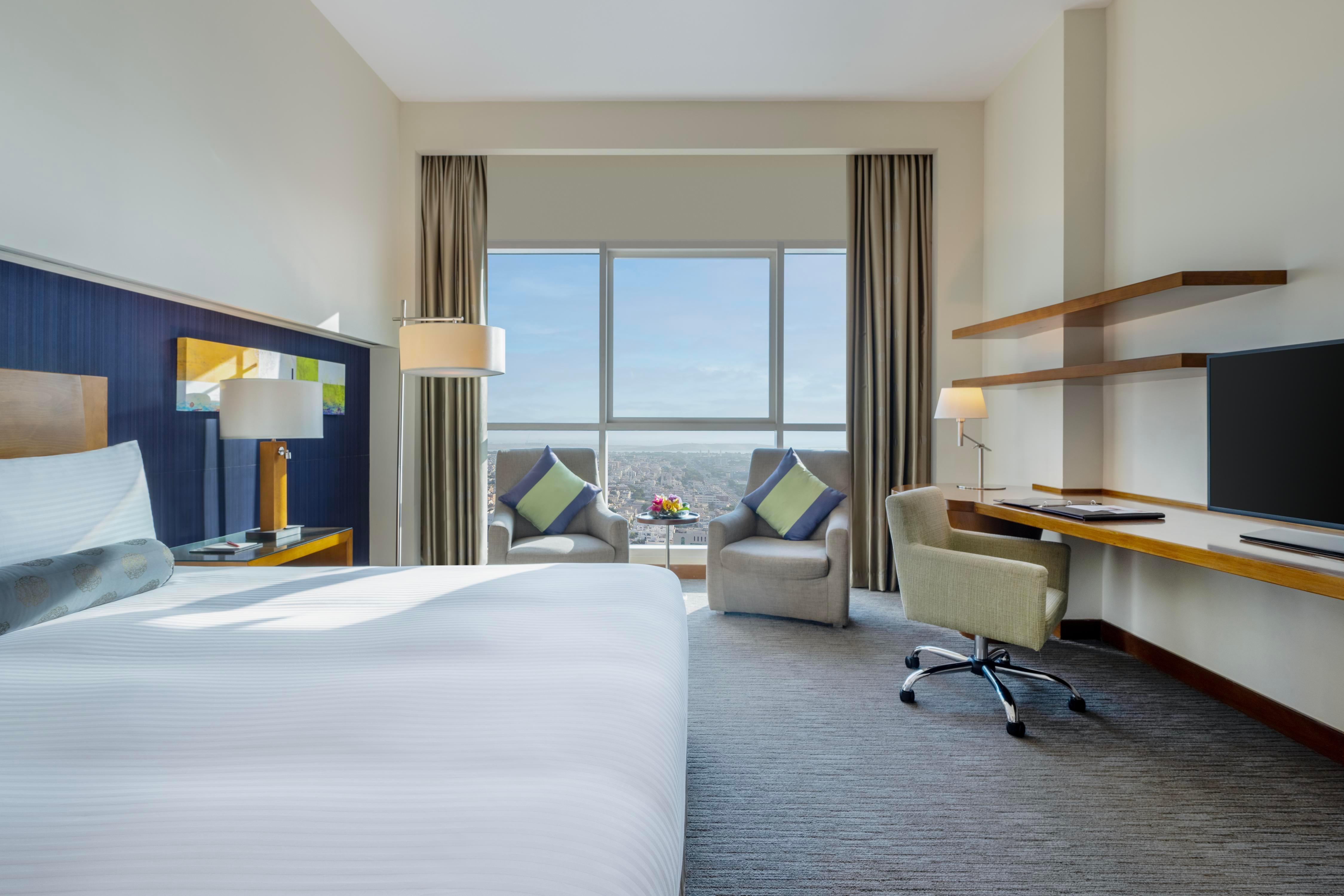 Grand Millennium Al Wahda Hotel and Executive Apartments Abu Dhabi - Tap to explore photos