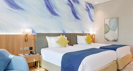  Movenpick Grand Al Bustan Room Type - Deluxe Room with 2 single beds
