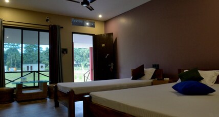 Villa De Hollong Jungle Resort Room Type - Non Ac triple bed room Villa De Hollong Jungle Resort Room Type - Non Ac triple bed room