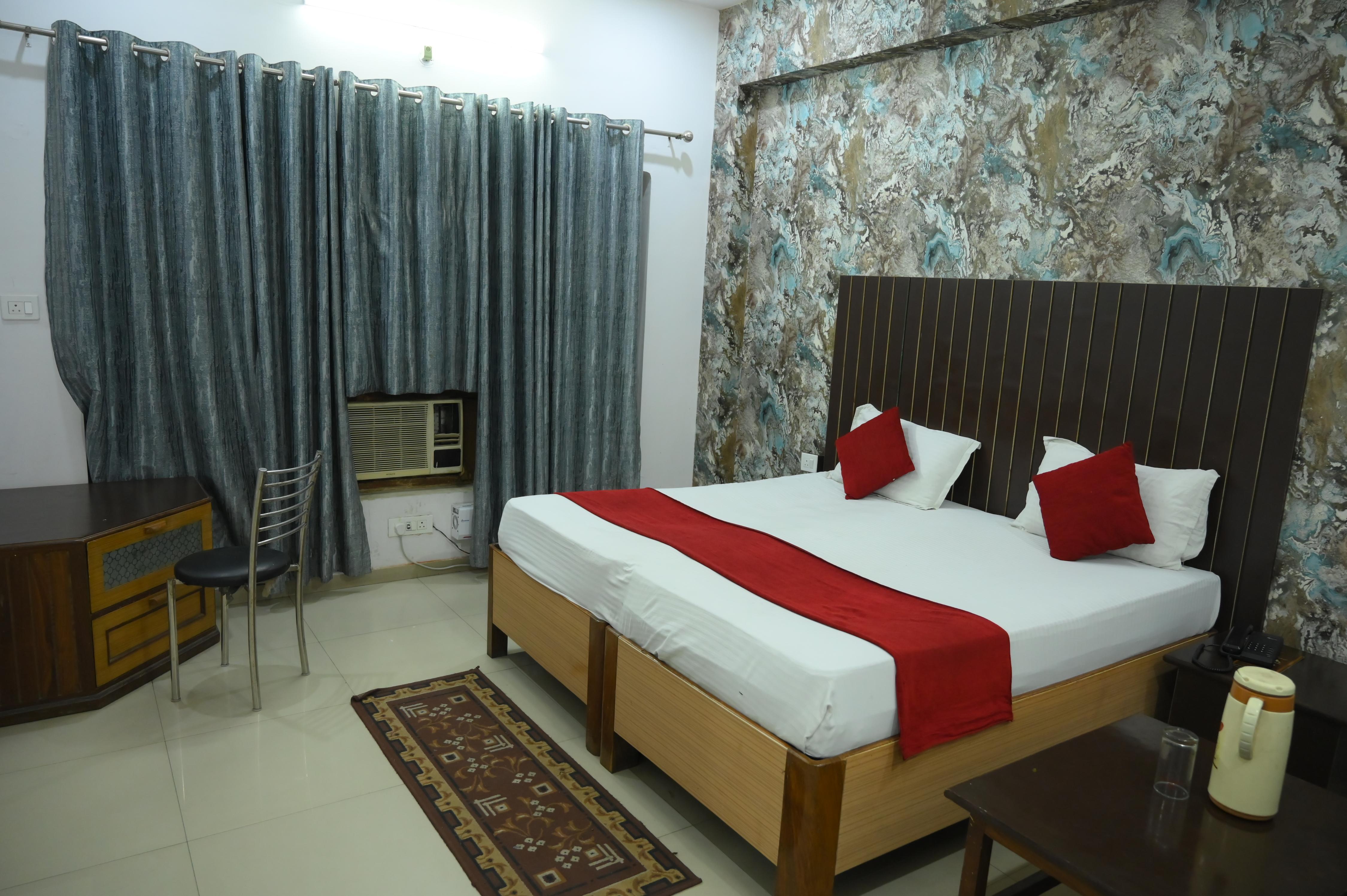 Hotel Mansarover - Tap to explore photos
