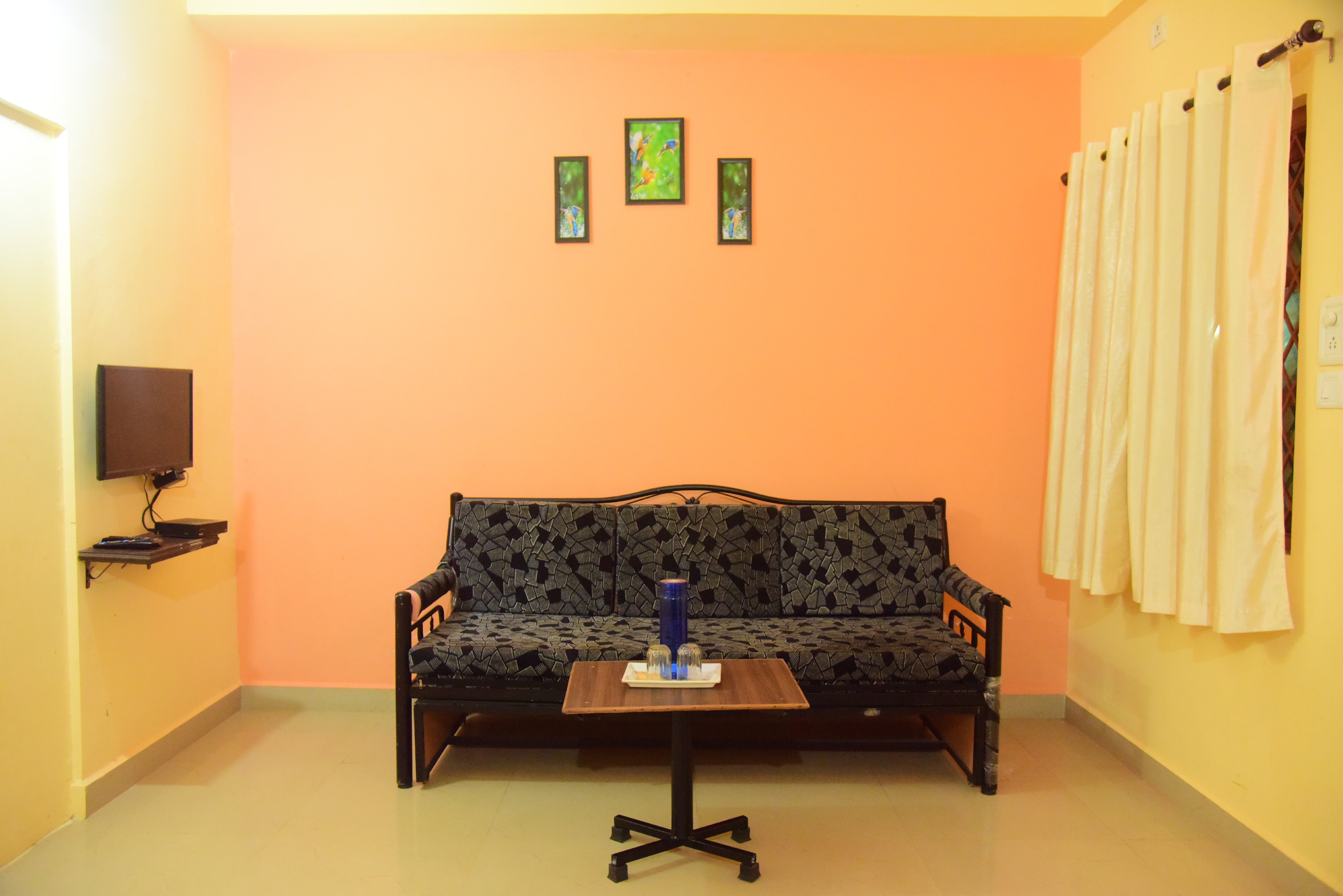 Bliss Holiday Inn - Tap to explore photos