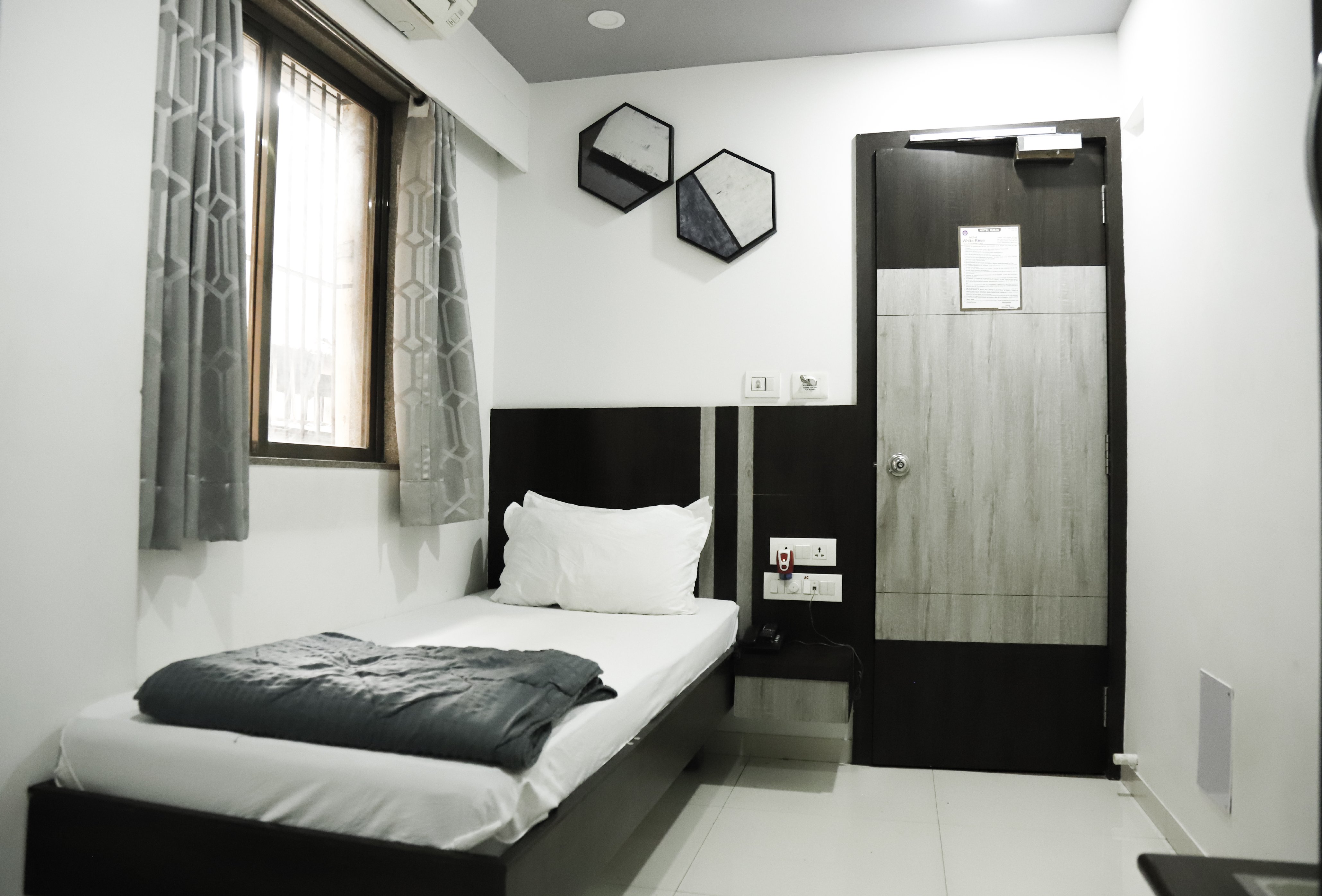 Hotel White Rose & Dormitory - Tap to explore photos