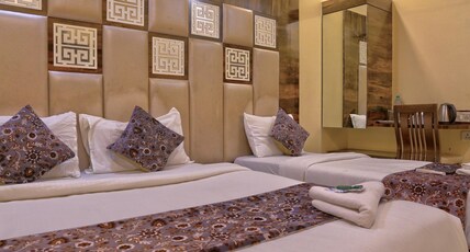HOTEL MAGNET MUMBAI INTERNATIONAL AIRPORT T-2 Room Type - Deluxe Tripple Room HOTEL MAGNET MUMBAI INTERNATIONAL AIRPORT T-2 Room Type - Deluxe Tripple Room