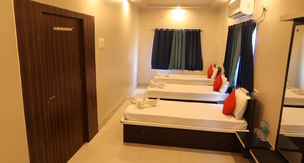 Dhanraj Residency Room Type - Family Room with 4 Single Beds