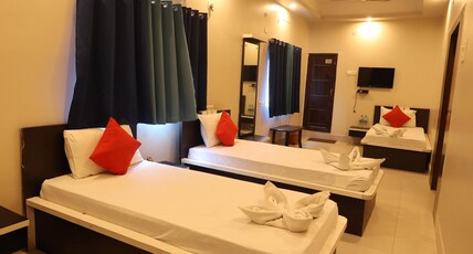 Dhanraj Residency Room Type - Family Room with 4 Single Beds