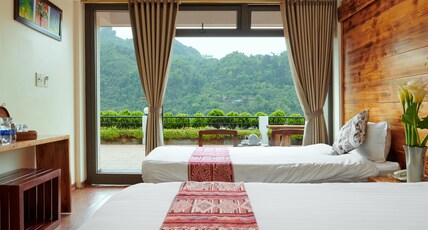 Sapa Village Hotel Room Type - Deluxe Triple Room with Mountain View and Terrace Sapa Village Hotel Room Type - Deluxe Triple Room with Mountain View and Terrace