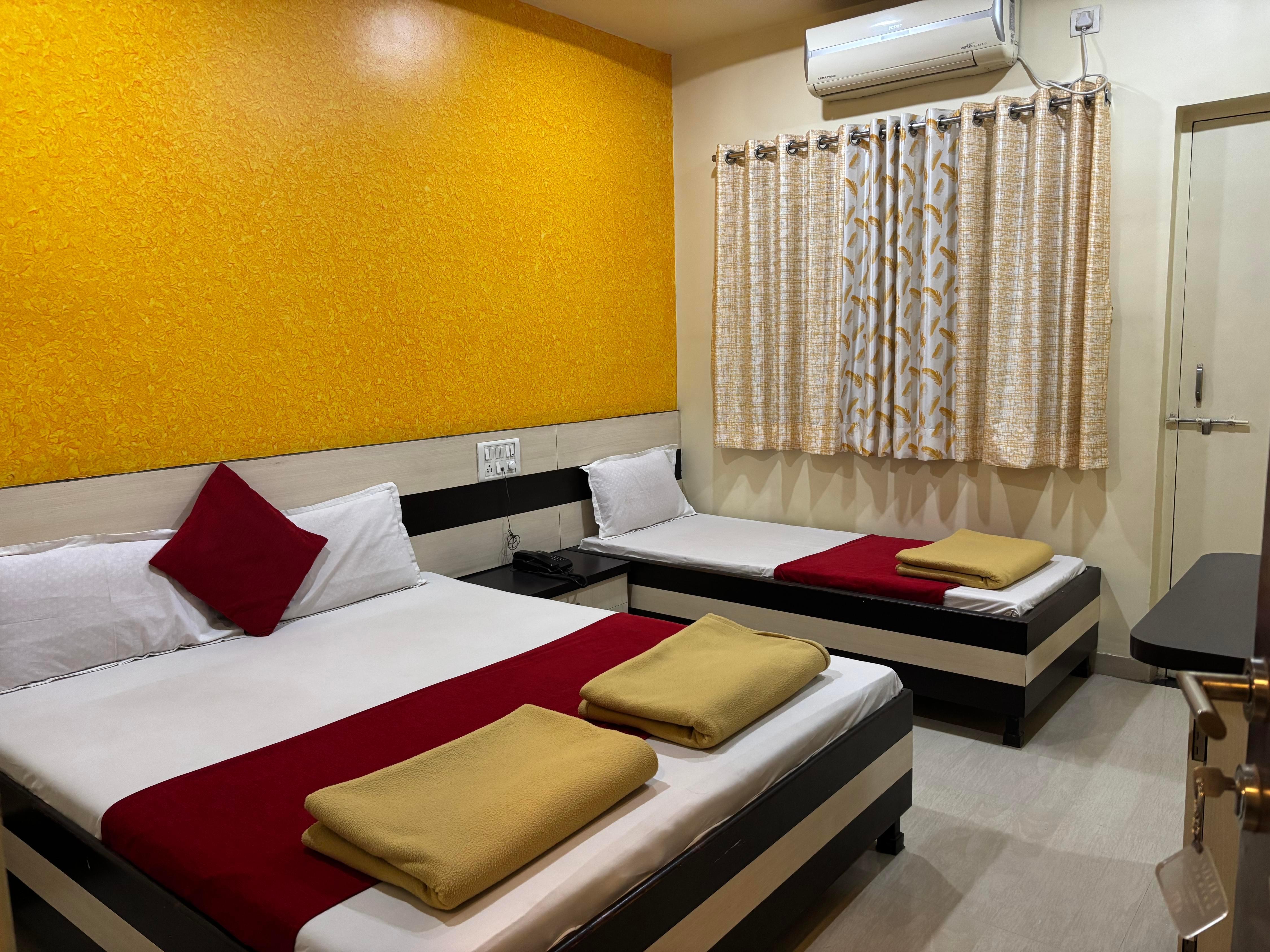 Hotel Sai Leela Room Type - Deluxe Triple Bed Room AC
