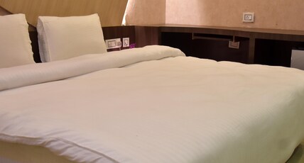 Hotel Mahendra Plaza Room Type - Deluxe Room.