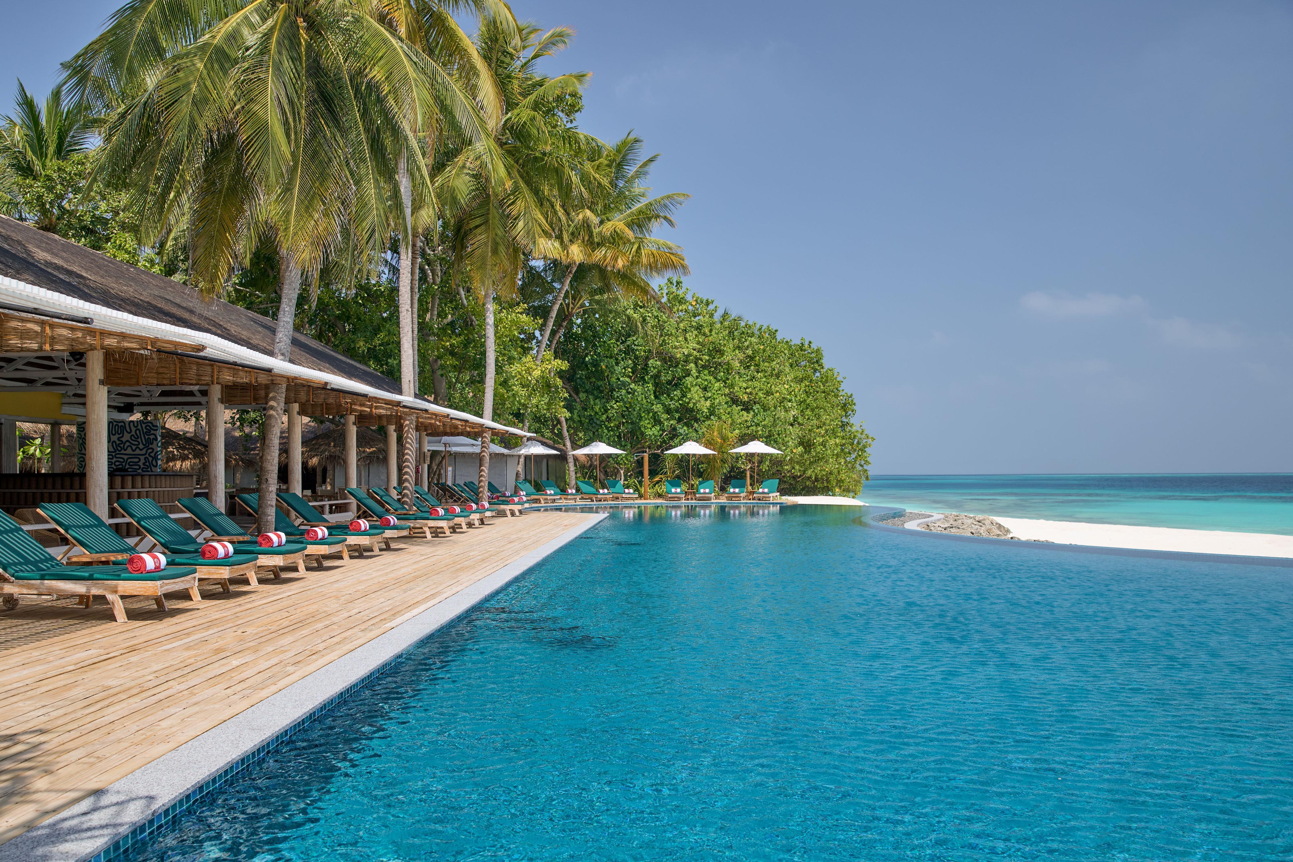 NH Collection Maldives Reethi Resort - Tap to explore photos