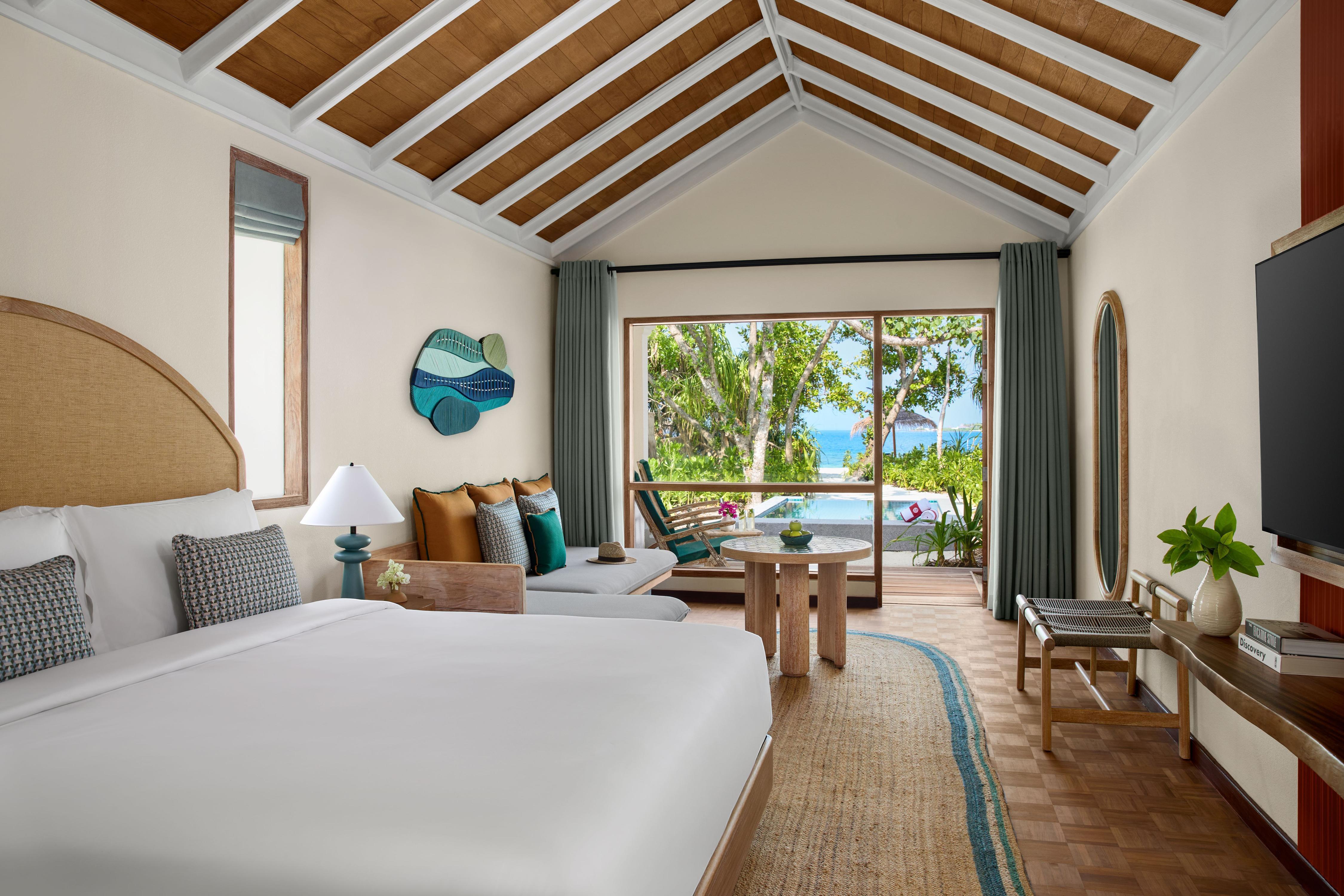 NH Collection Maldives Reethi Resort - Tap to explore photos