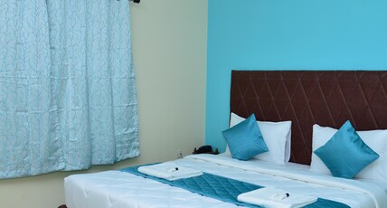V M Comfort Room Type - Deluxe AC Room