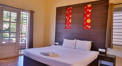 Dew Drop Inn Room Type - Deluxe Room Dew Drop Inn Room Type - Deluxe Room