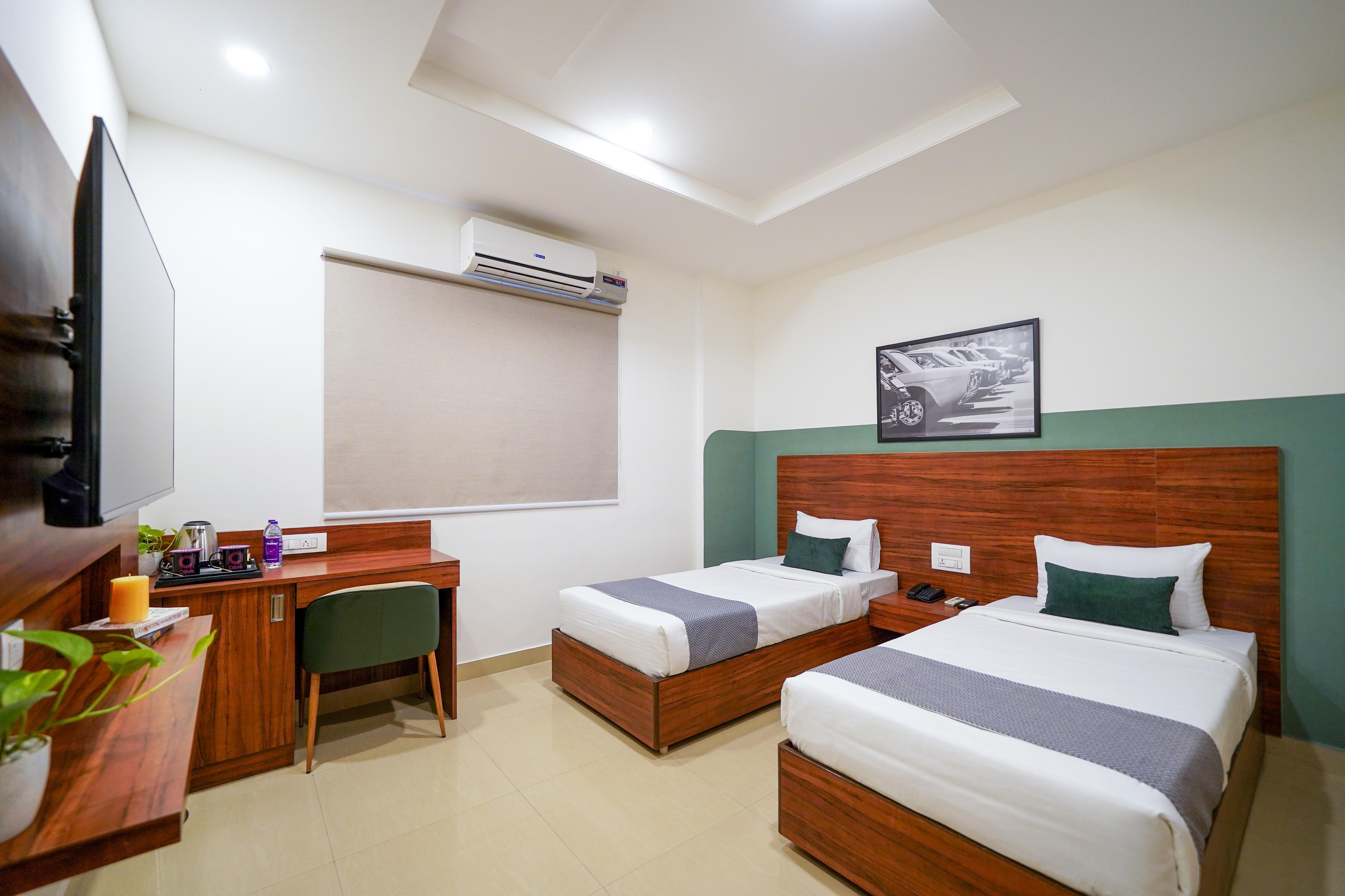 Olive Hotel Airport road -  Yelahanka by Embassy Group - Tap to explore photos