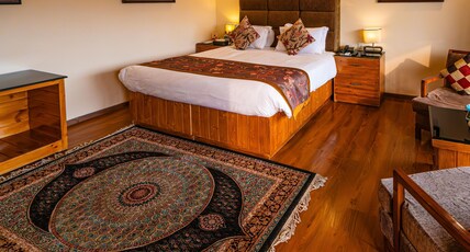 The Orchard Retreat & Spa Room Type - Luxury bedroom with Private balcony and garden view The Orchard Retreat & Spa Room Type - Luxury bedroom with Private balcony and garden view