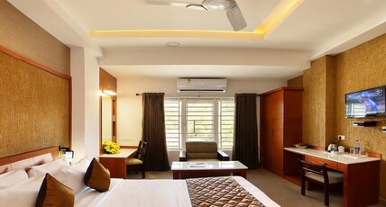 Kgees- HillTown Hotel Room Type - Premium Deluxe AC Room
