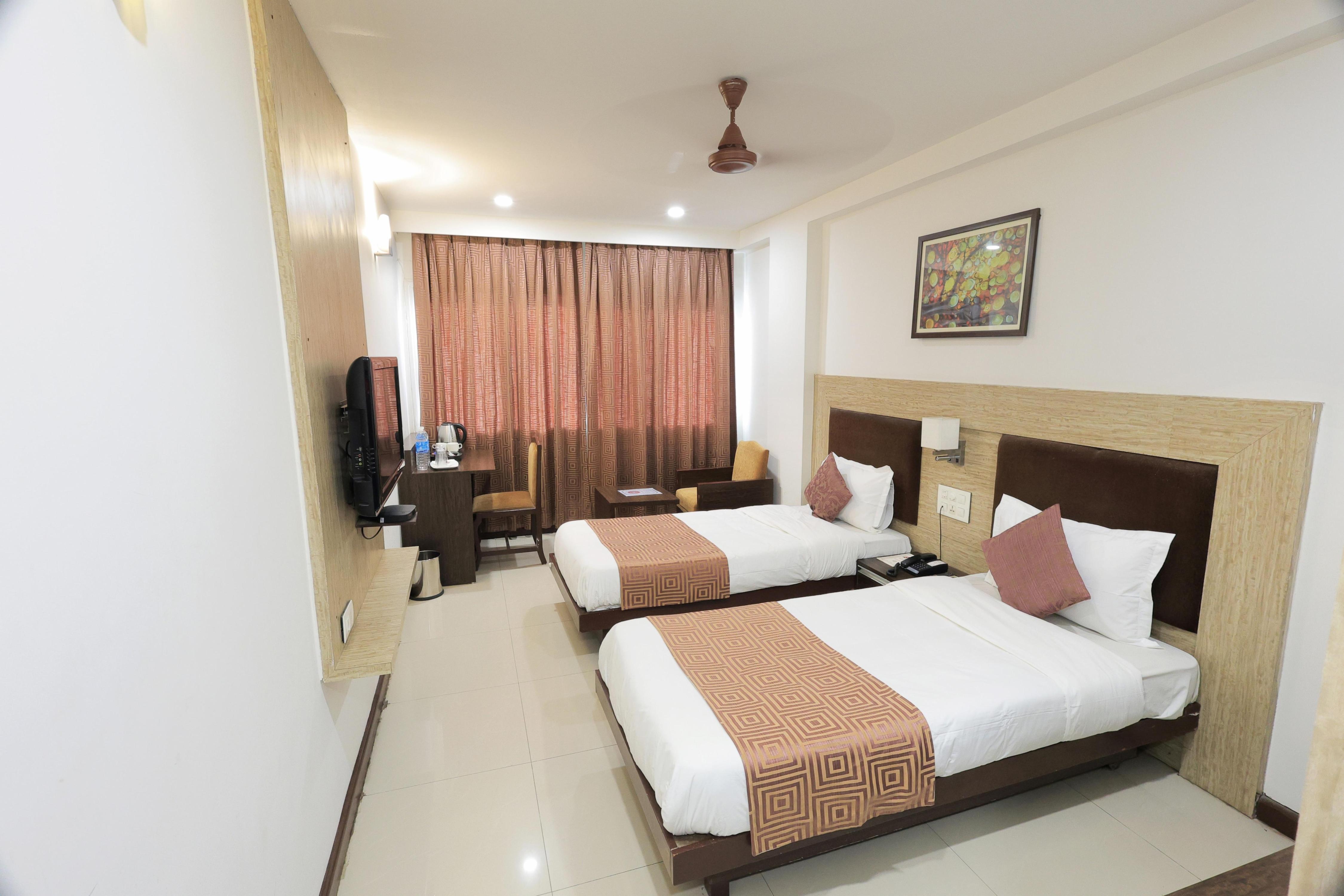 Palette Hotel Surya by CheckIn, Vadodara Room Type - Deluxe with Twin Bed