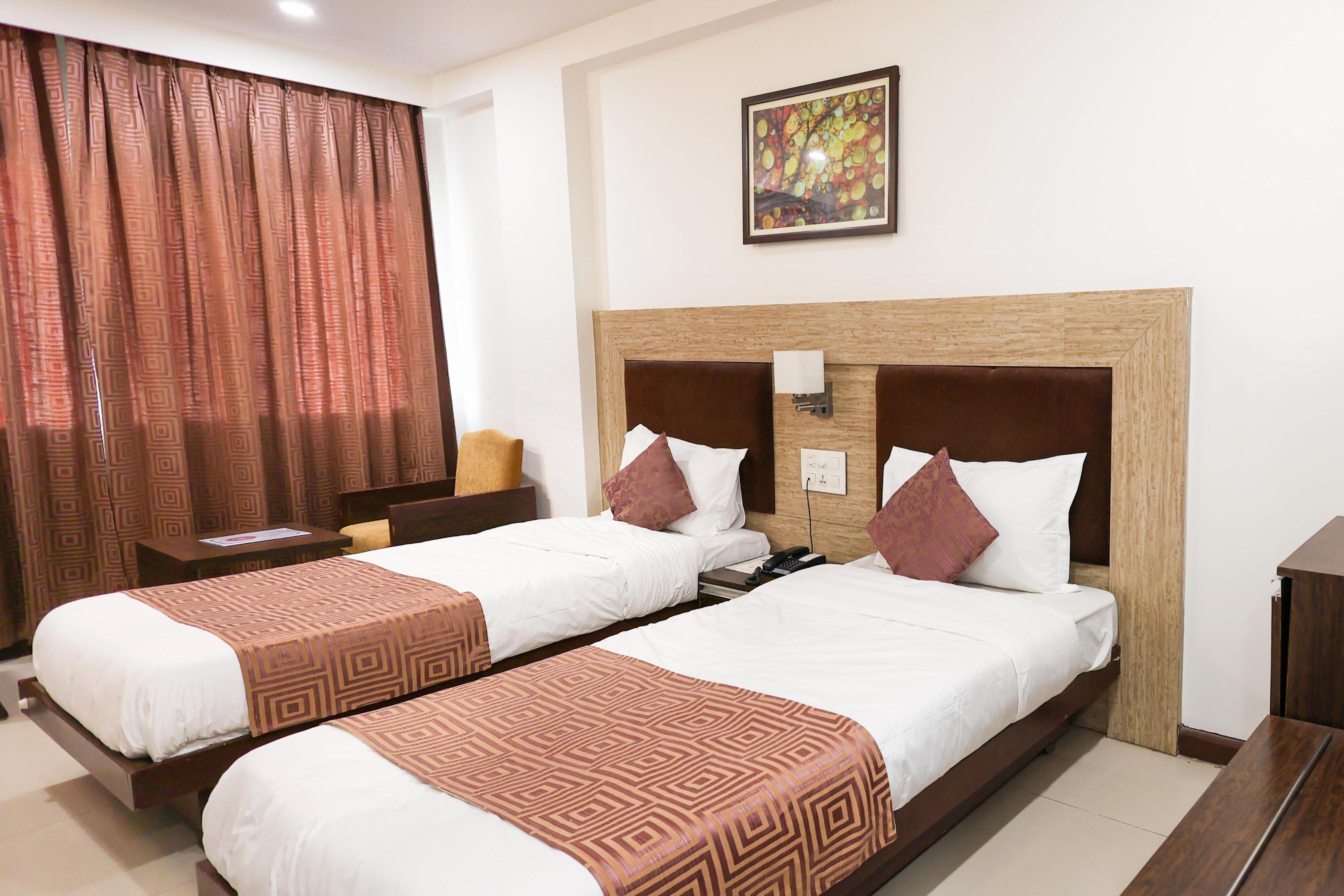 Palette Hotel Surya by CheckIn, Vadodara - Tap to explore photos