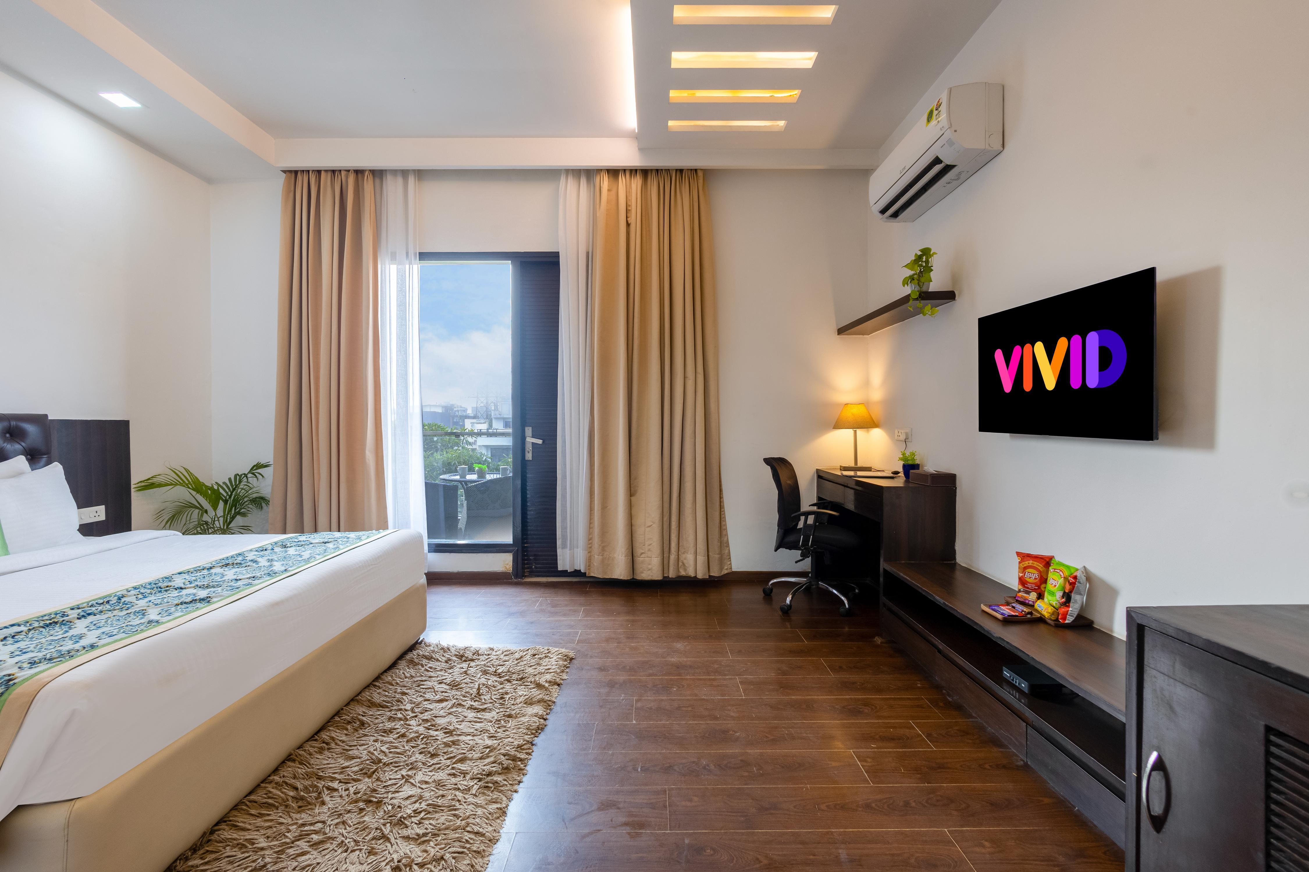 Vivid Boutique Hotel by The Hoften, Gurugram - Tap to explore photos
