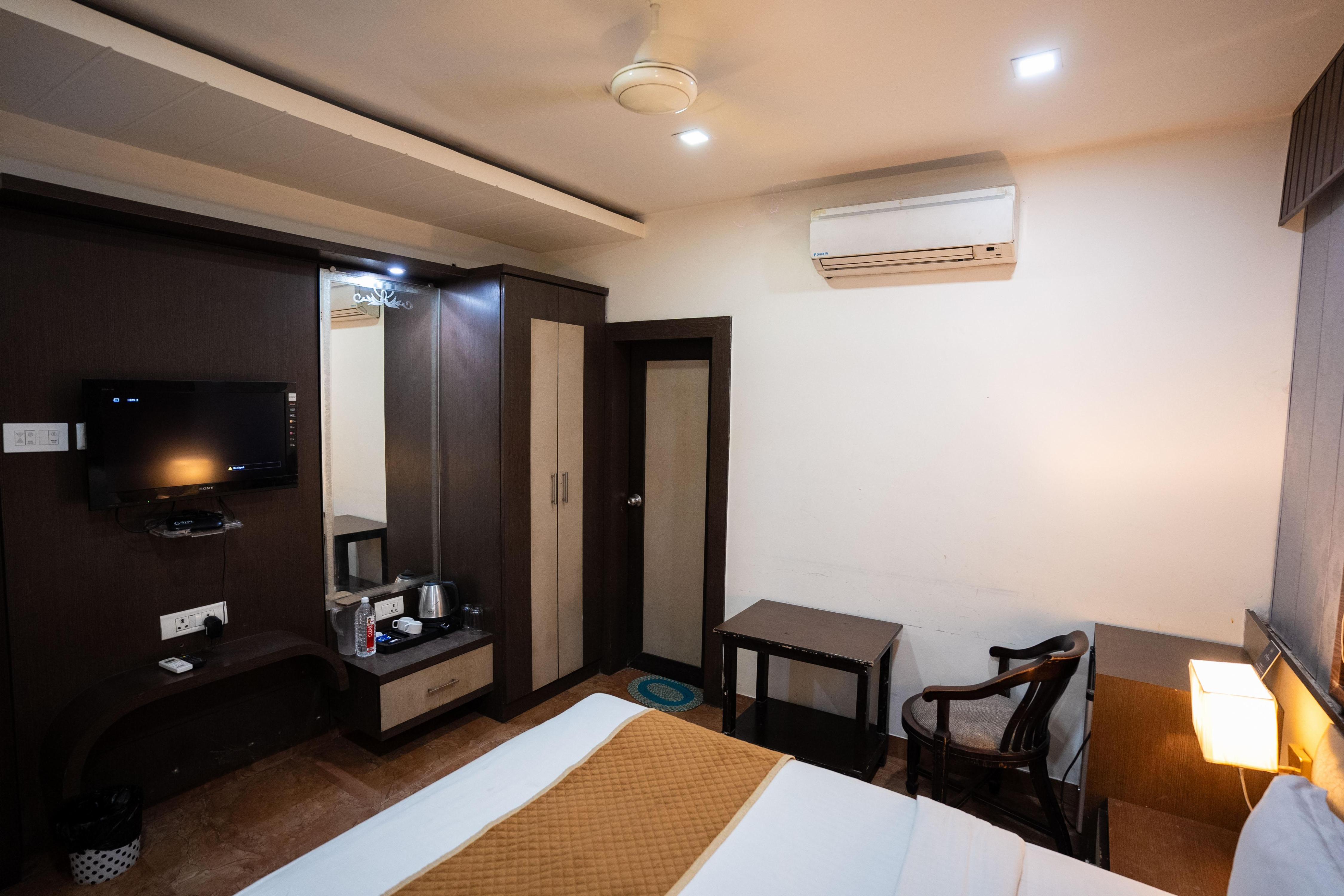 Hotel J S Residency - Tap to explore photos