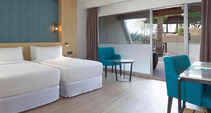 Occidental Sharjah Grand Room Type - Deluxe Cabana with direct pool access Occidental Sharjah Grand Room Type - Deluxe Cabana with direct pool access