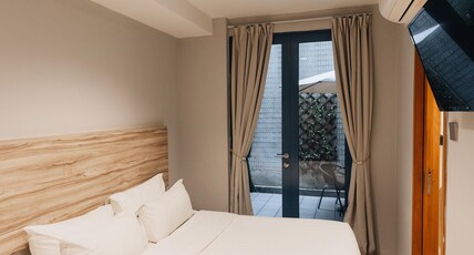 Victoria Hotel, a NuVe Group Collection Room Type - Deluxe King with Balcony