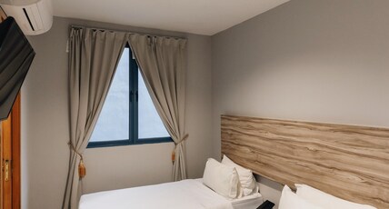 Victoria Hotel, a NuVe Group Collection Room Type - Deluxe Twin Room