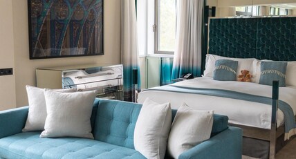 The Athenaeum Hotel & Residences Room Type - Suite Room