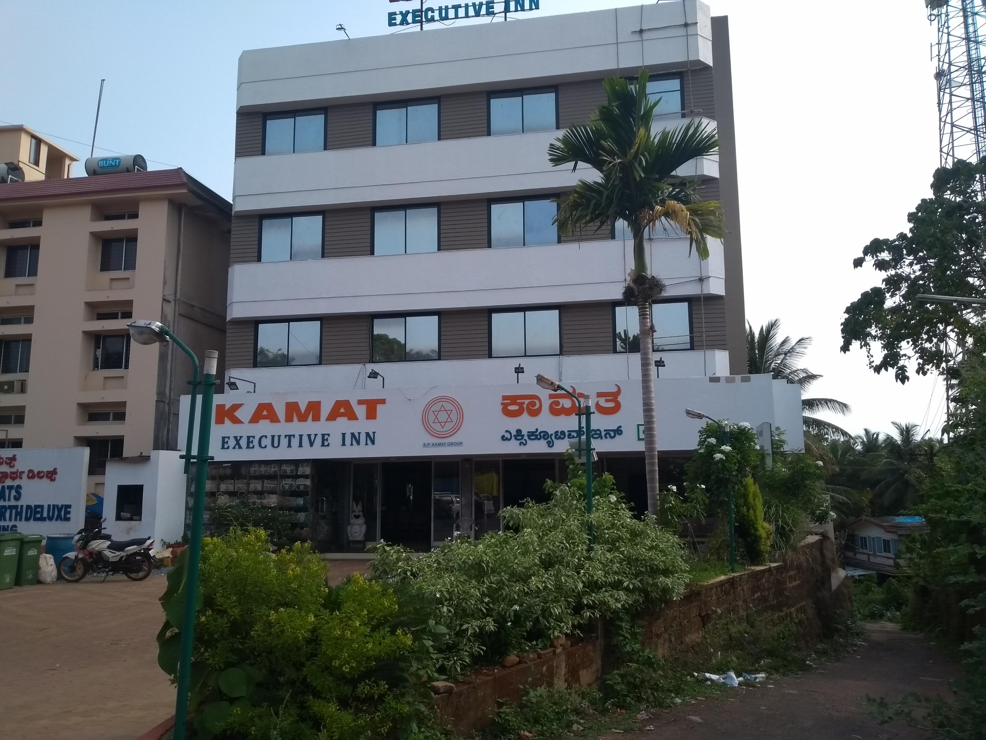 KAMAT EXECUTIVE INN - Tap to explore photos