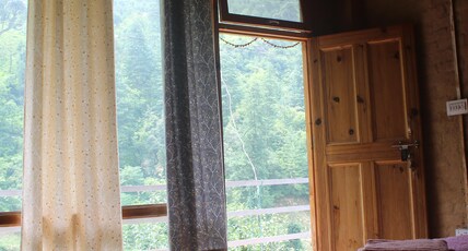 POOJA RIVER VIEW HOME STAY Room Type - STANDARD ROOM