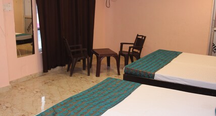 Hotel Shri Krishna Inn  1 KM from Shri Kashi Vishwanath Temple Room Type - Family Four Bed Room