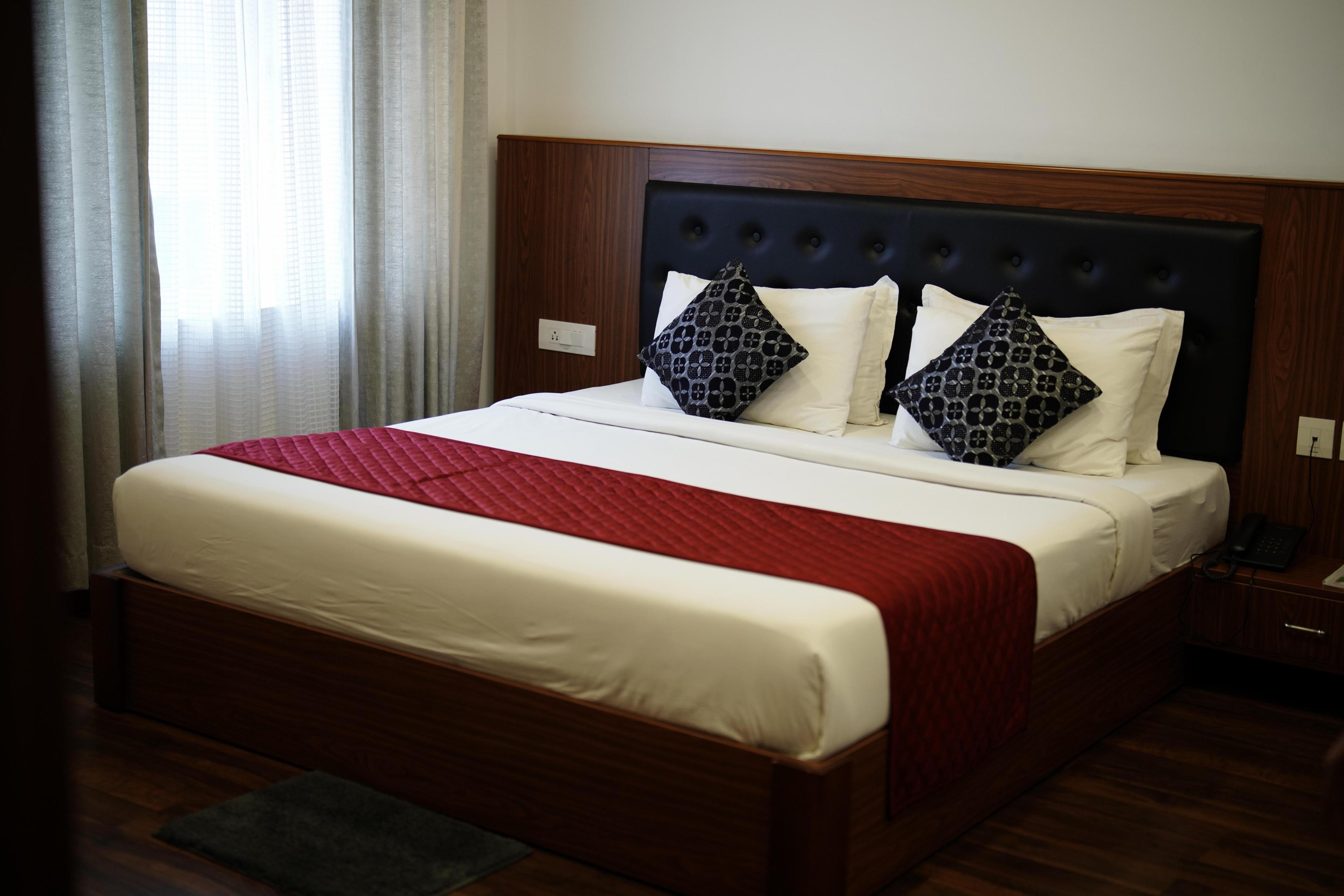 FOUR N SQUARE RESIDENCY Room Type - Deluxe Room