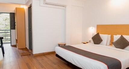 Magnum Resorts- Near Candolim Beach Room Type - Deluxe Room with Balcony Magnum Resorts- Near Candolim Beach Room Type - Deluxe Room with Balcony