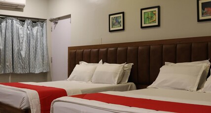 Raghunandan Residency Puri Room Type - Deluxe Family Room (2 Queen Beds)
