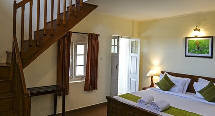 Teanest Nightingale by Nature Resorts and Stays Room Type - Scarlet Minivet
