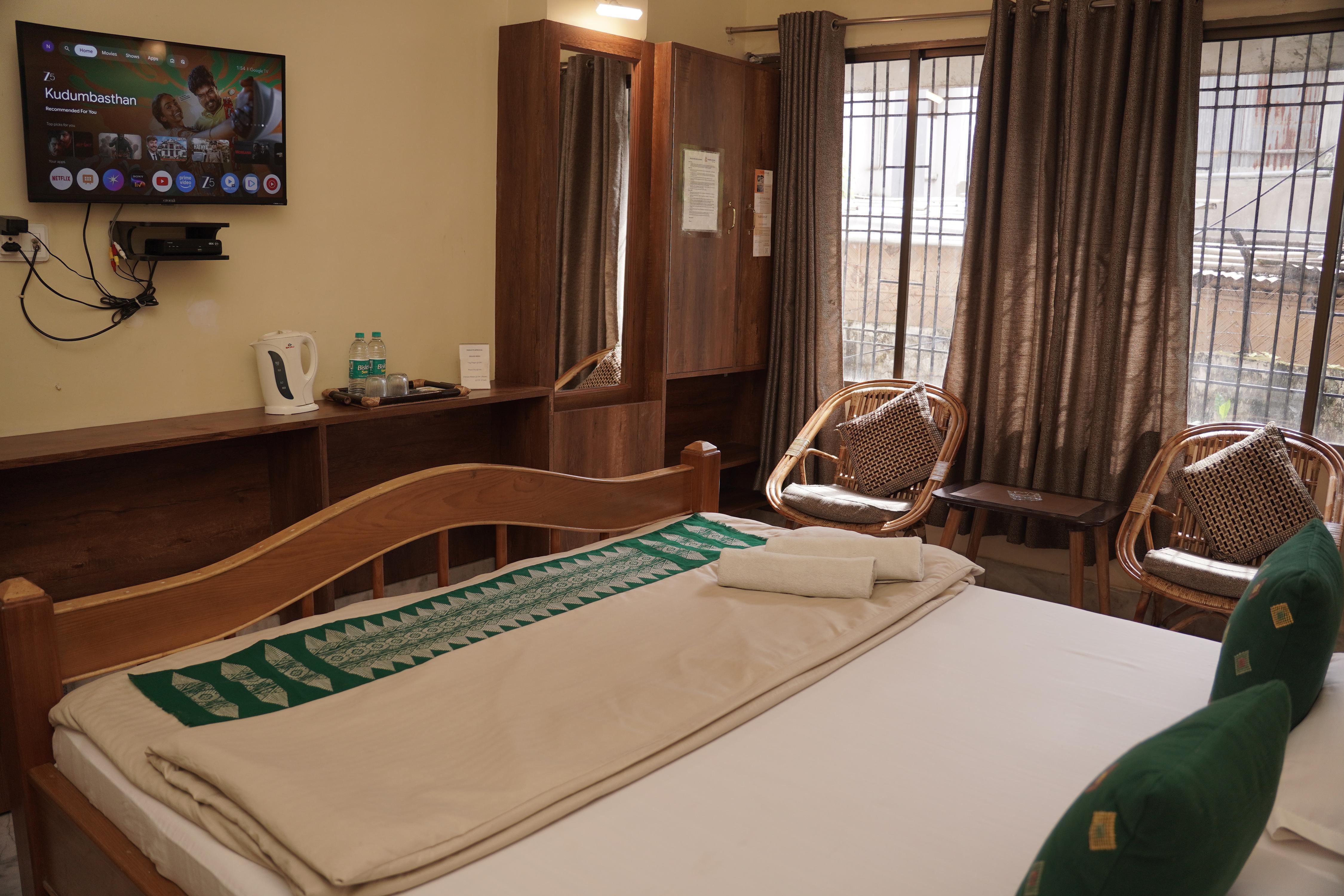 Nirvana Guest House - Tap to explore photos