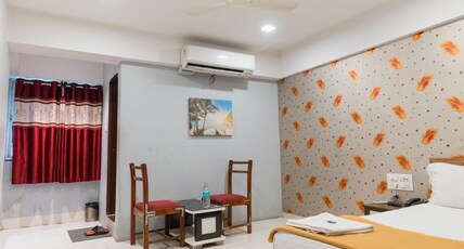 HOTEL BLUE ORCHID Room Type - Deluxe - AC